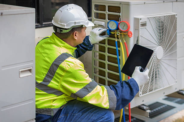 Professional Air Conditioning Repair technician working in Minster, OH